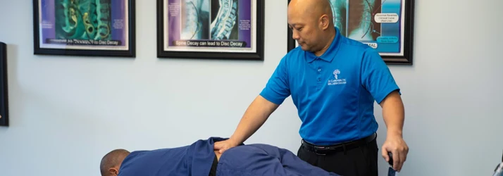Chiropractor Durham NC Sanghyun Ju Adjusting Patient What To Expect